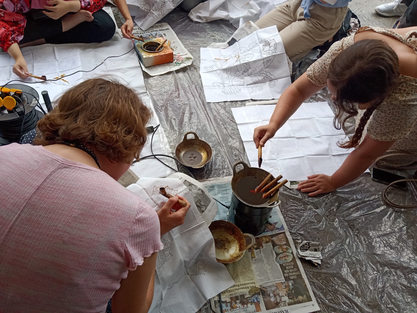 A picture containing person, people, meal, cooking

Description automatically generated